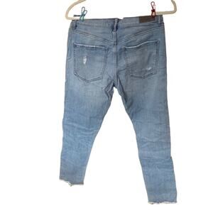 Express nineteen eighty stripe light‎ blue distressed jeans. Size 4
